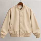 mens leather jacket
sheepskin jacket
leather bomber
beige leather
oversized bomber
mens bomber jacket
genuine leather
cream bomber
varsity jacket
button up jacket
leather outerwear
mens streetwear
minimalist jacket
