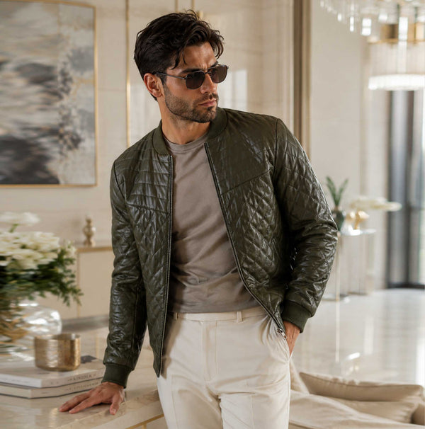 Refined, modern, and effortlessly stylish, the Velmori Olive Diamond Quilted Leather Bomber Jacket is crafted from premium genuine leather with a sophisticated quilted texture. Designed for men who appreciate luxury fashion and everyday versatility, this slim-fit bomber jacket delivers comfort, durability, and timeless appeal for casual and smart-casual wear.