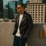 SaltCo Men's Black Biker Leather Jacket featuring genuine leather construction, asymmetrical zipper closure, silver hardware, and classic motorcycle styling.