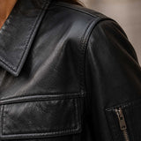 Shoulder seam and stitching craftsmanship detail of The Corvayne leather bomber jacket.