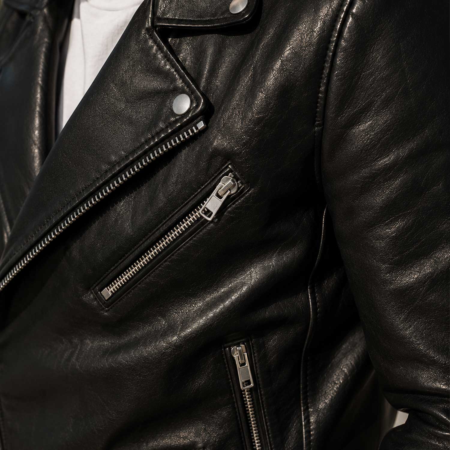 SaltCo Men's Black Biker Leather Jacket featuring genuine leather construction, asymmetrical zipper closure, silver hardware, and classic motorcycle styling.